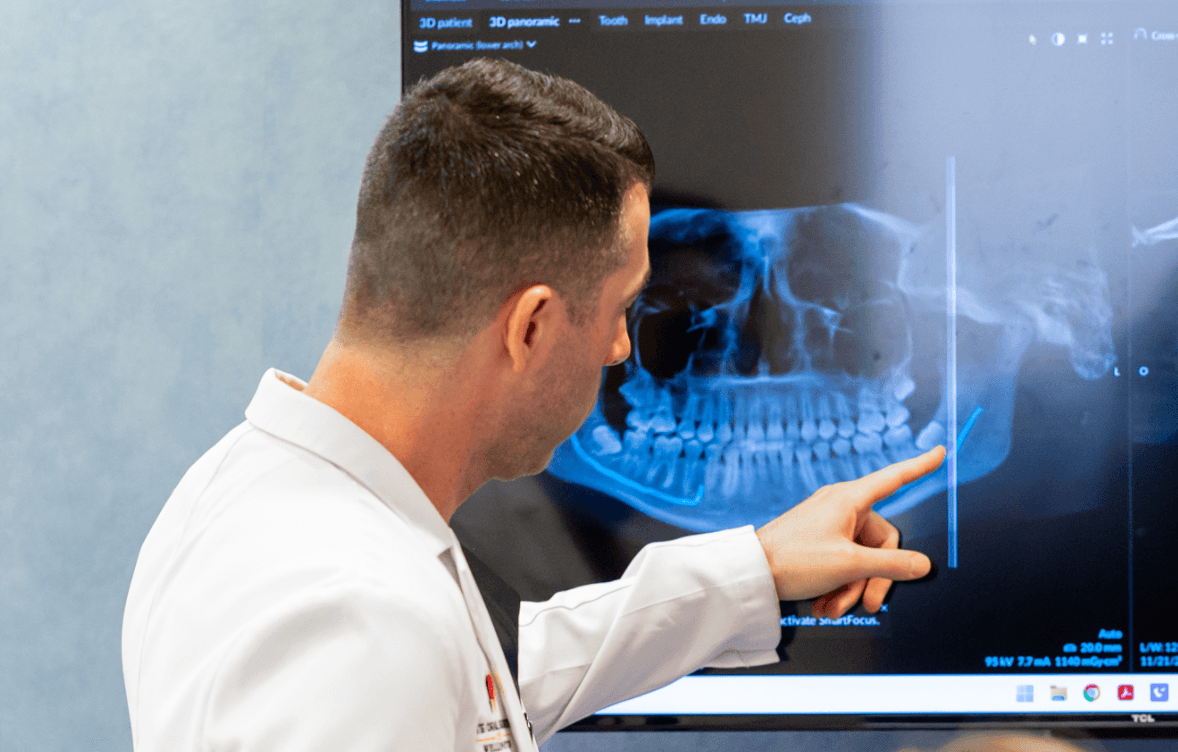 Oral surgeon preparing instruments